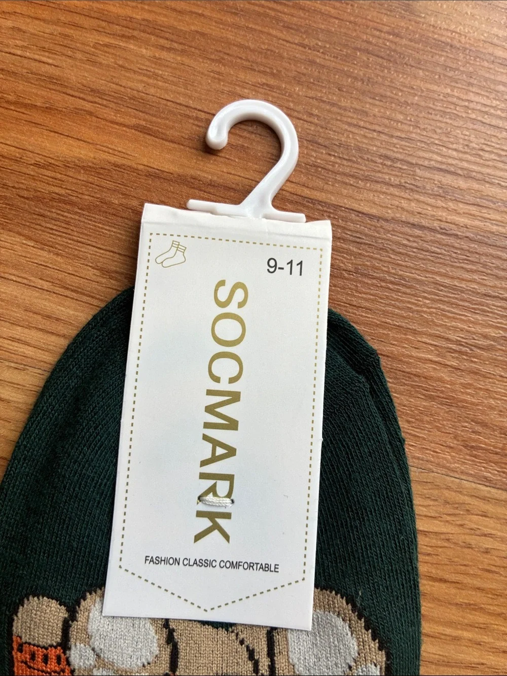 mark. Dark Green Socks with Orange Bear Accent